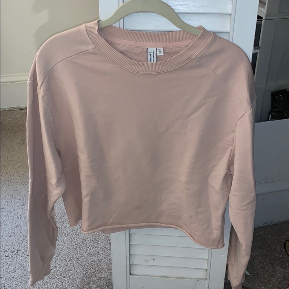 Light pink cropped sweatshirt from & Other Stories